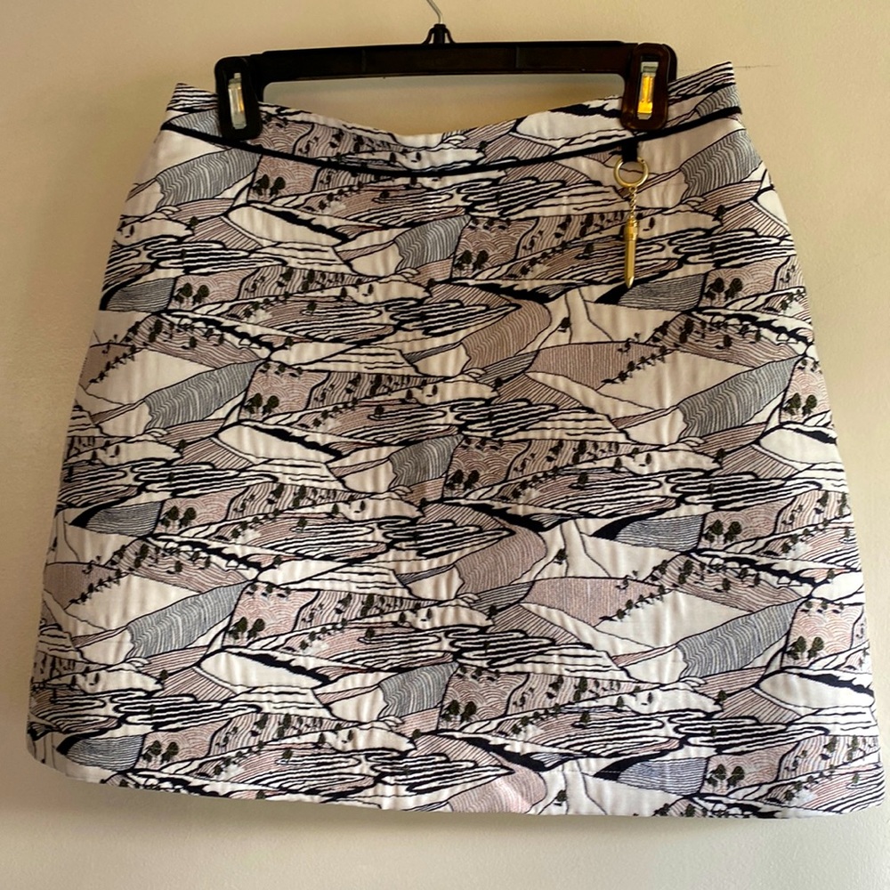 This fun and funky Ted Baker mini skirt with pockets has a quilted quality.